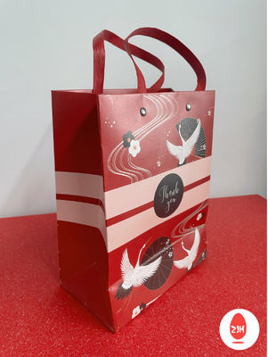Coutume de emballage de sacs de cadeau de papier d'emballage de bande dessinée imprimée avec des poignées