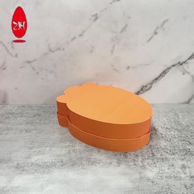 L'oeuf de pâques créatif a formé le couvercle et le fond de papier de boîte d'emballage de cadeau